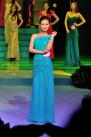 11月10日，2013环球旅游小姐国际大赛重庆赛区举行总决赛，第五名20号选手马佳进行晚礼服展示。